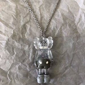 Kaws figure pendant clear